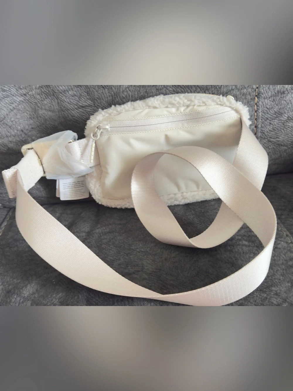 lululemon athletica Cream Faux Shearling Crossbody Pouch with Gold Logo